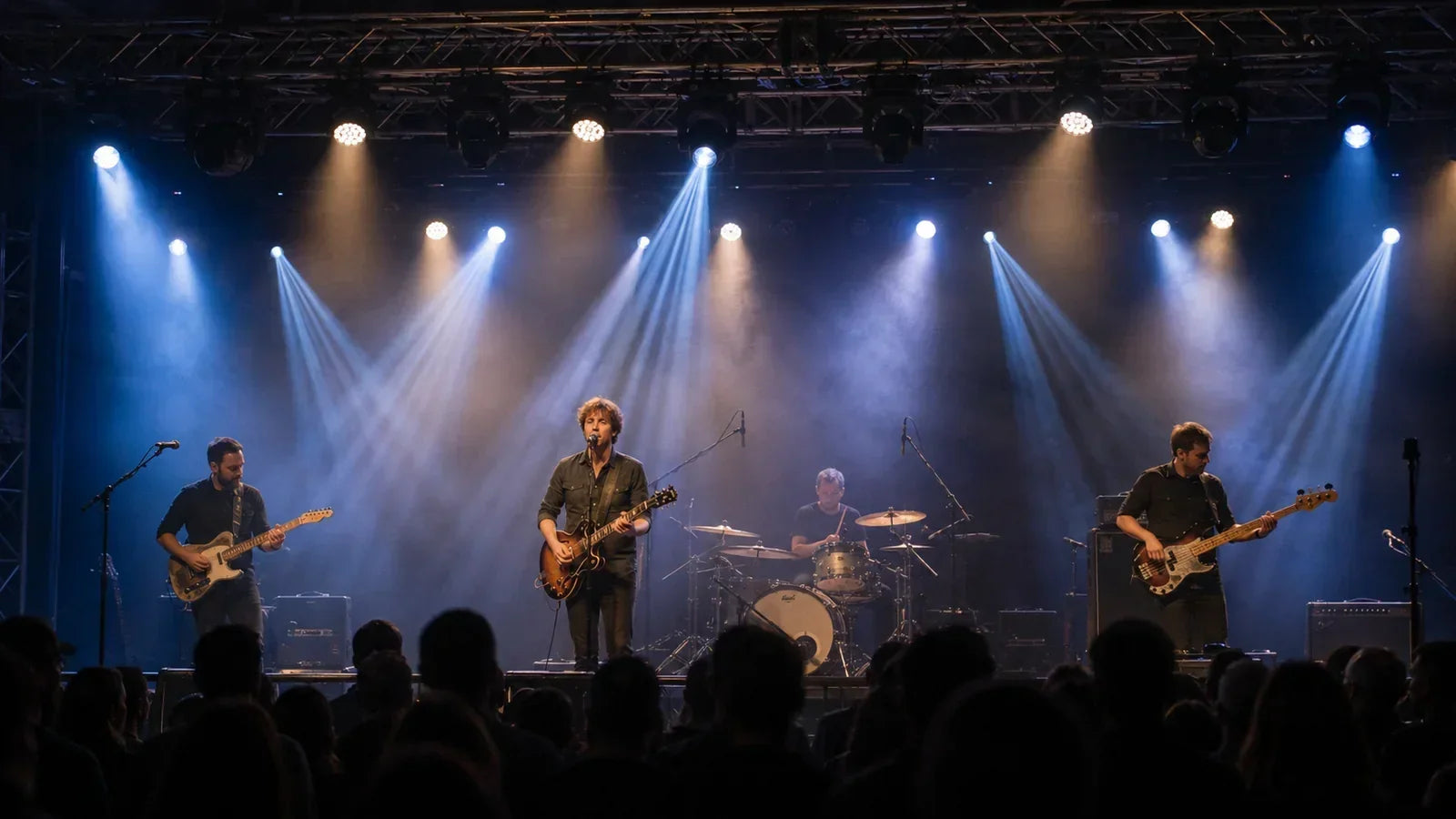 Live concert continues under balanced fallback lighting after one moving head fails