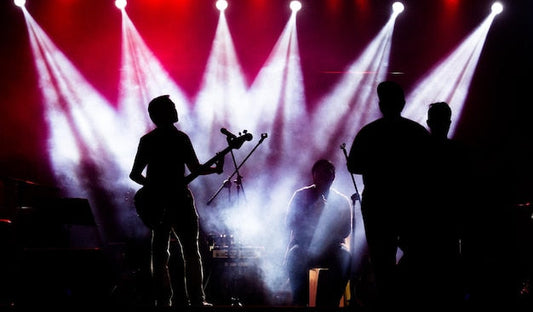rock band performance with stage lighting